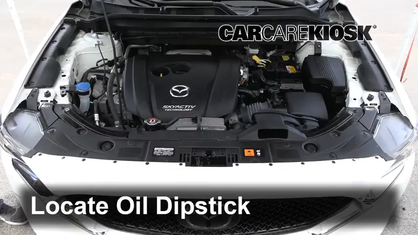 2019 Mazda CX-5 Touring 2.5L 4 Cyl. Aceite Controlar nivel de aceite